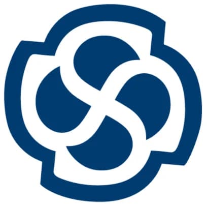 Professional architect working on complex system diagrams on large monitor displaying UML models and architectural frameworks in modern office environment